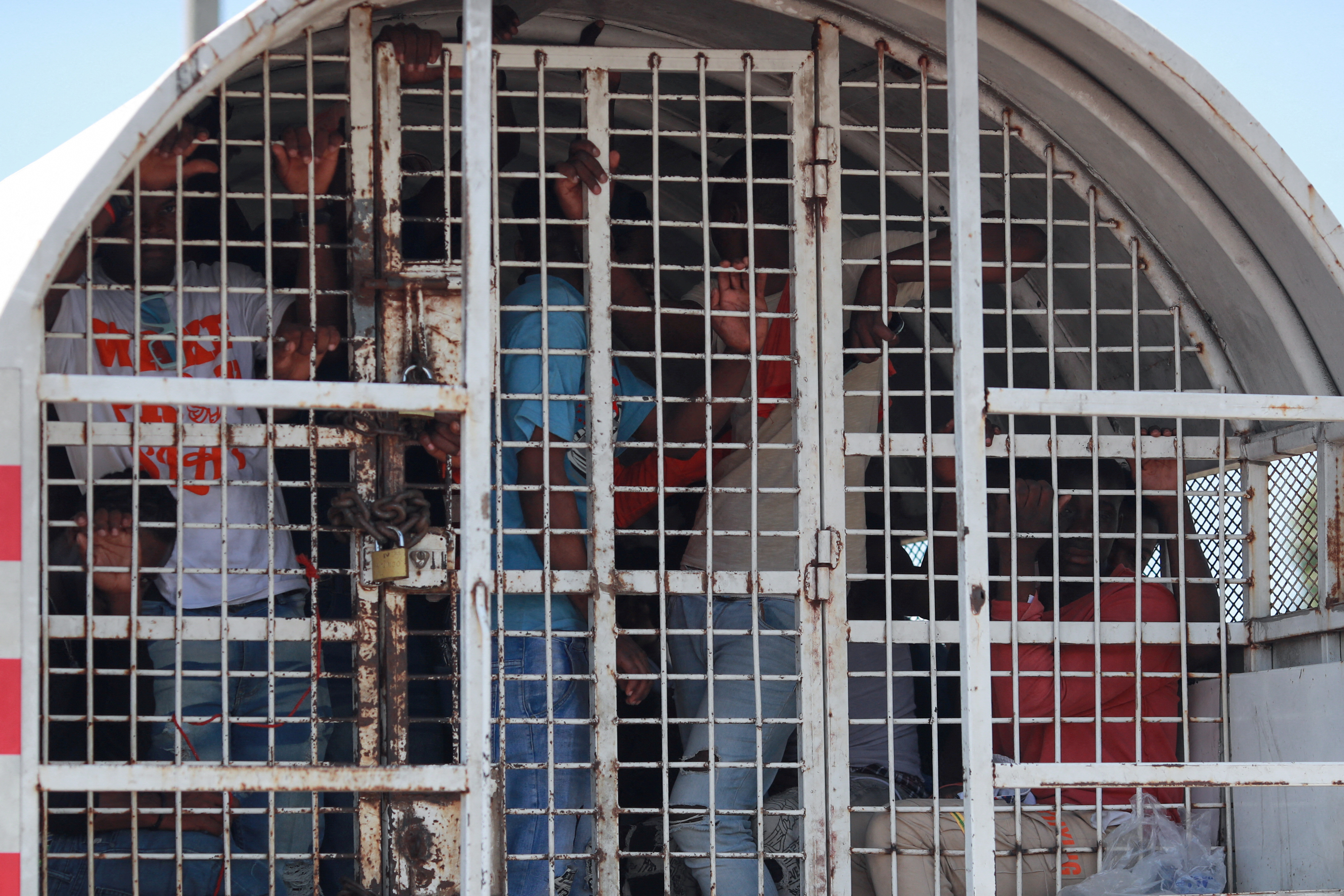 FILE PHOTO: Detained undocumented Haitians are taken to the border of Haiti and the Dominican Republic to be deported, in Haina