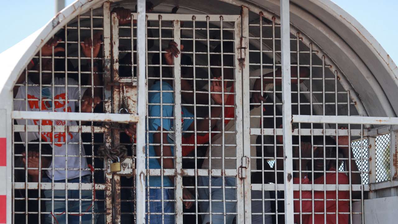FILE PHOTO: Detained undocumented Haitians are taken to the border of Haiti and the Dominican Republic to be deported, in Haina