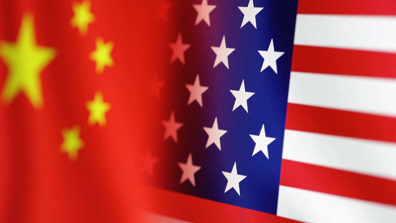 Illustration shows U.S. and Chinese flags