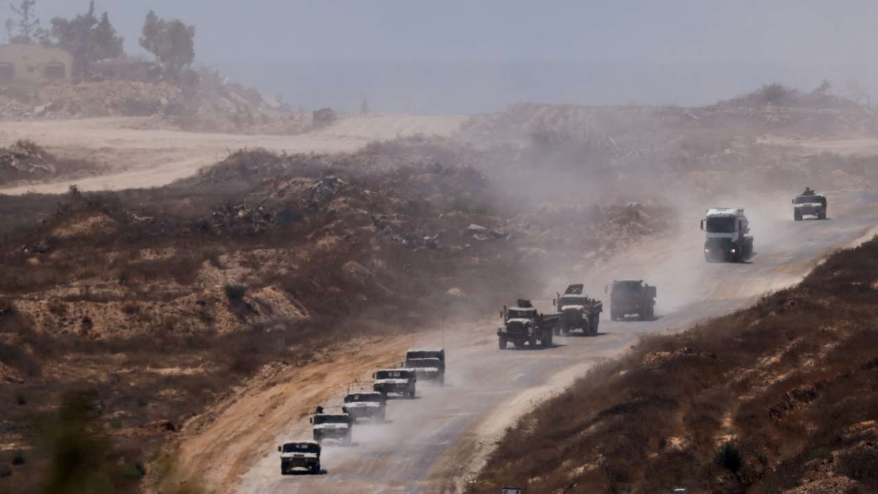 An Israeli military convoy moves inside the Gaza Strip