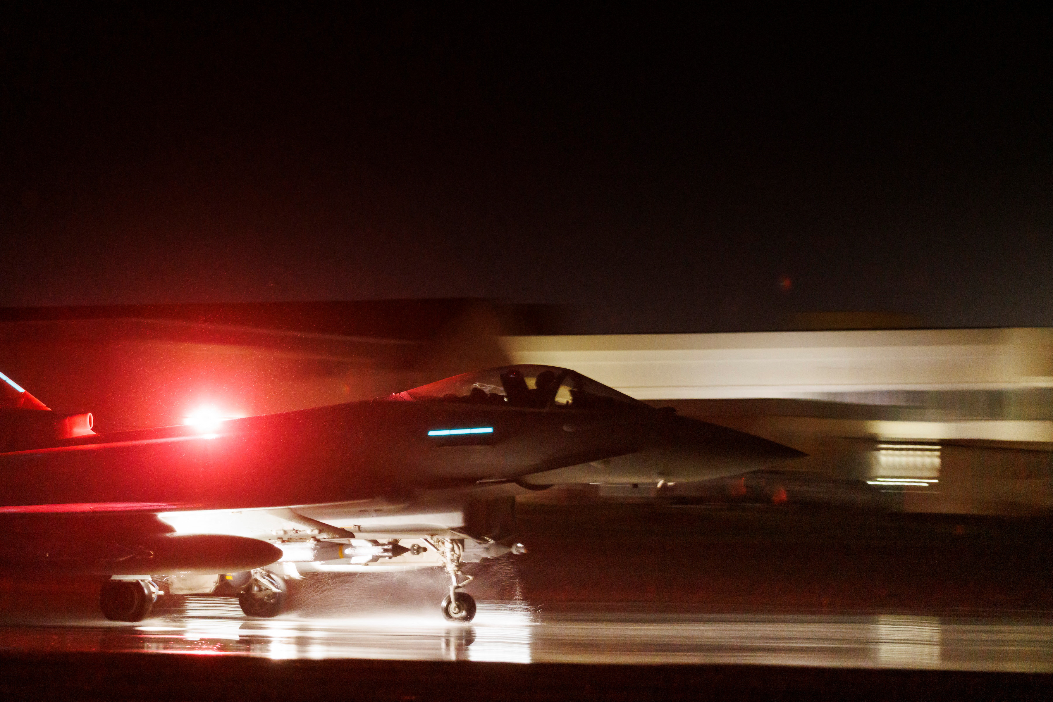 Royal Air Force Typhoon aircraft conduct precision strike operations