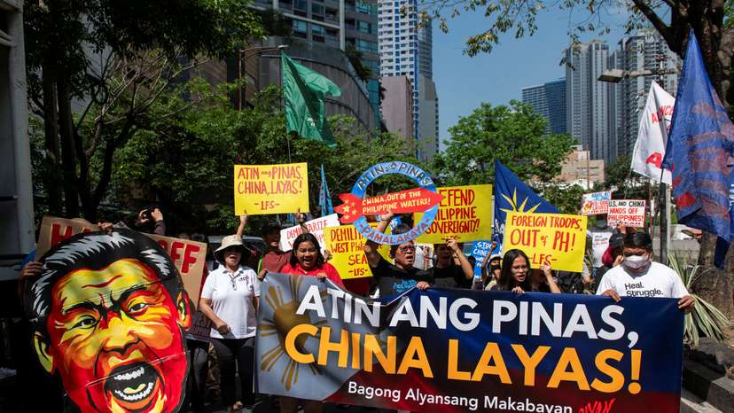 Filipino protesters hold a protest outside of Chinese Consulate in Makati, Philippines