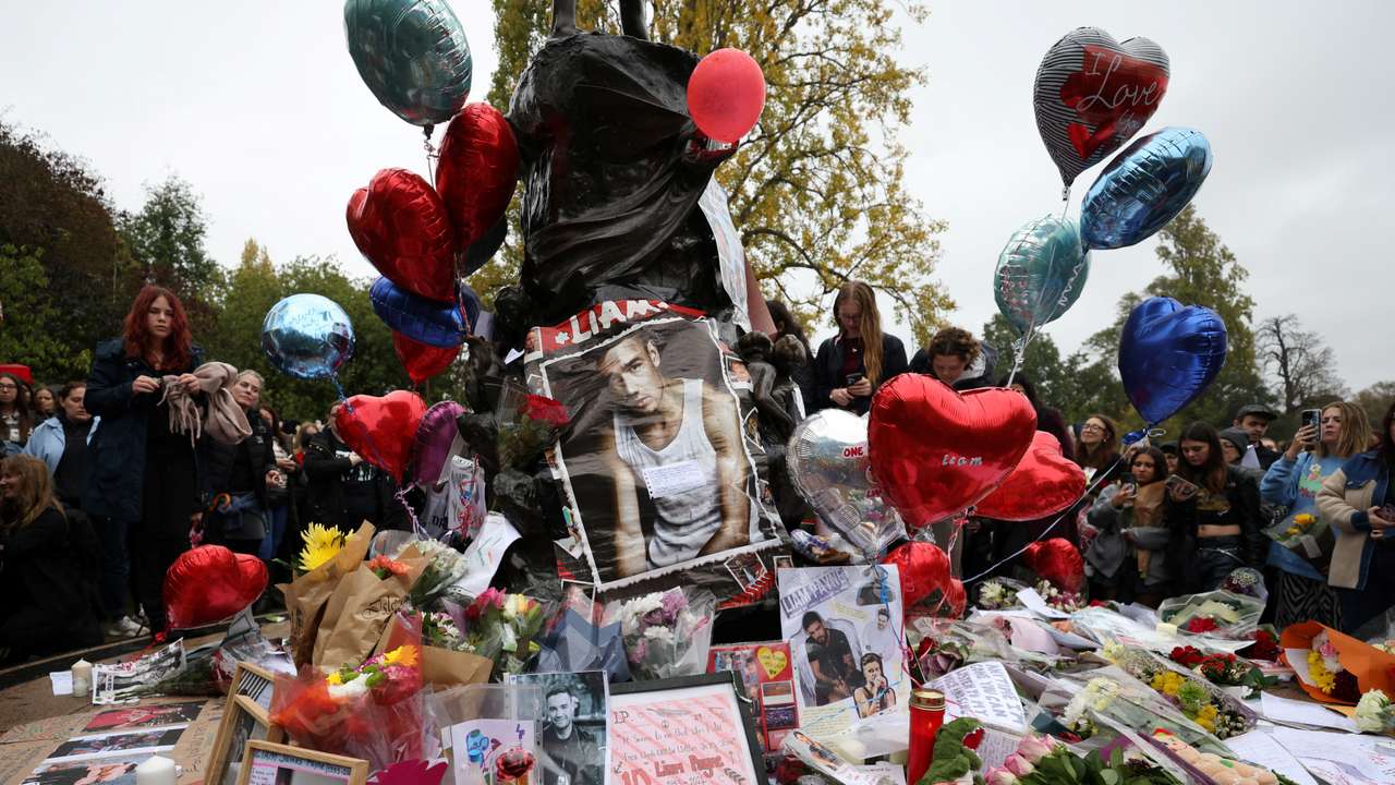 Fans gather to pay tribute to former One Direction singer Liam Payne in London