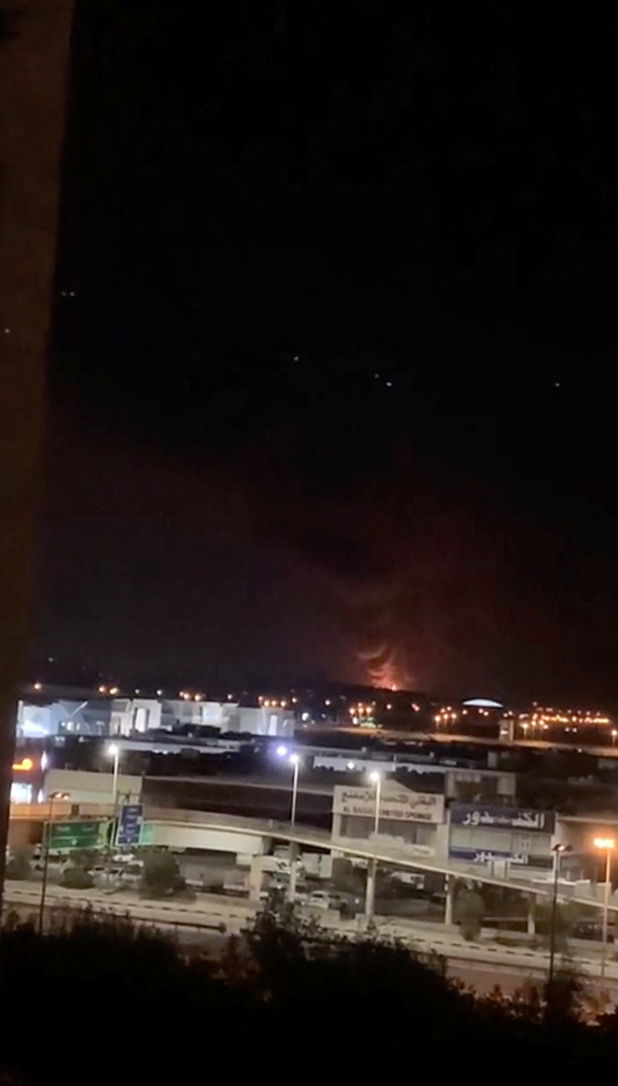 Smoke and fire rise in the direction of the fuel tank at Kuwait International Airport