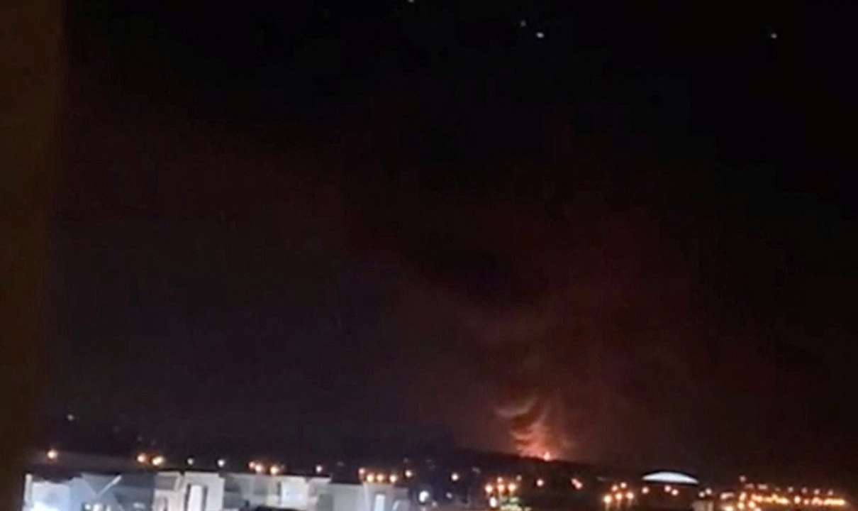 Smoke and fire rise in the direction of the fuel tank at Kuwait International Airport