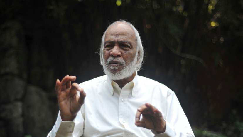 Bangladesh Nationalist Party’s Standing Committee member Abdul Moyeen Khan gestures during an interview with Reuters at his residence in Dhaka