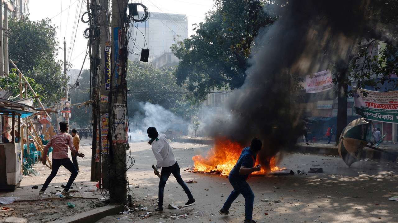 FILE PHOTO: Supporters of Bangladesh Nationalist Party (BNP) throw brickbats towards police during a clash in Dhaka
