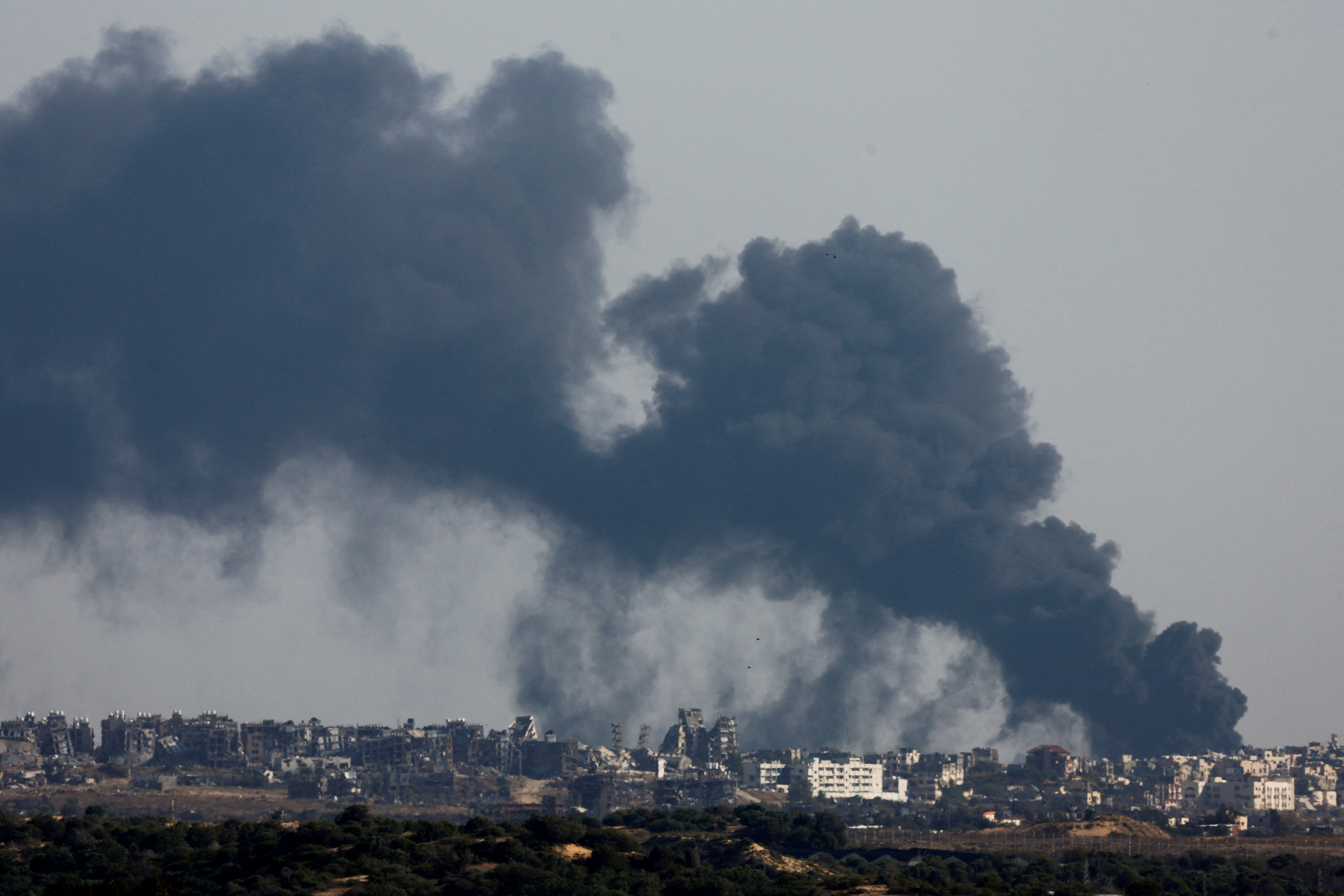 Smoke billows after an explosion in northern Gaza