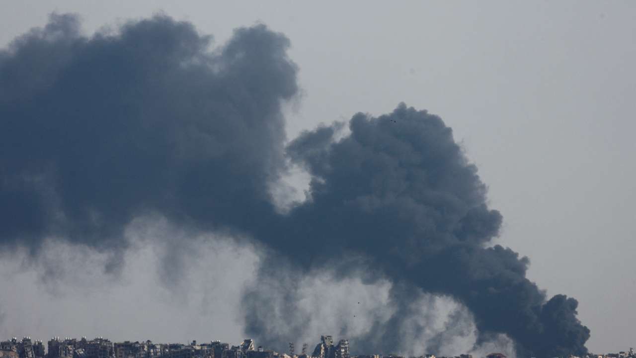 Smoke billows after an explosion in northern Gaza