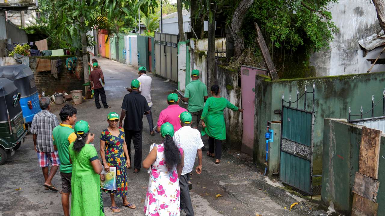 Samudra Jayalath, along with other supporters of the Samagi Jana Balawegaya (SJB) party take part in an election campaign for the upcoming presidential election, in Colombo