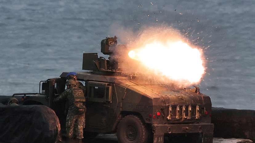 FILE PHOTO: A US-made TOW-2A wire-guided anti-tank missile, launched by Taiwanese soldiers from a M1167 TOW carrier vehicle