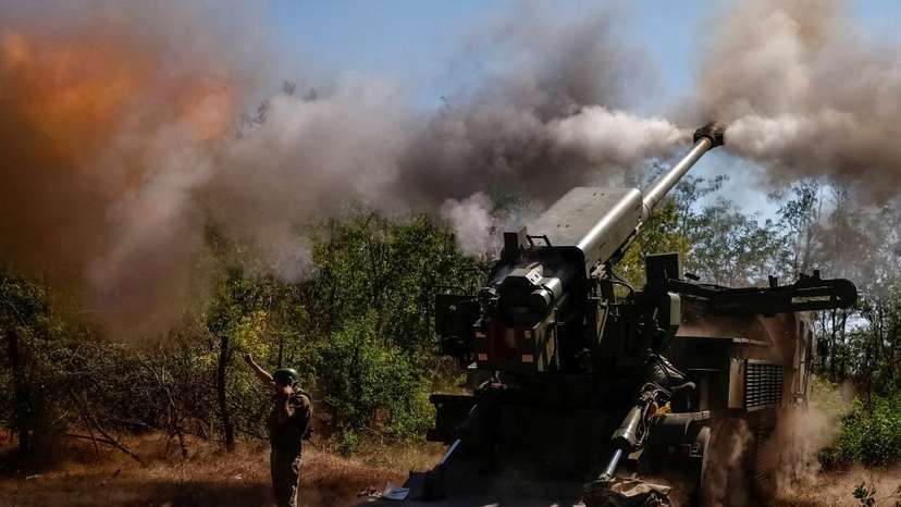 A Ukrainian serviceman fires a self-propelled howitzer towards Russian troops in Zaporizhzhia region
