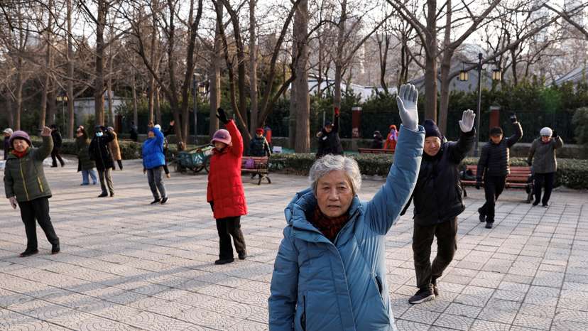 FILE PHOTO: Elderly people dance at a park in Beijing