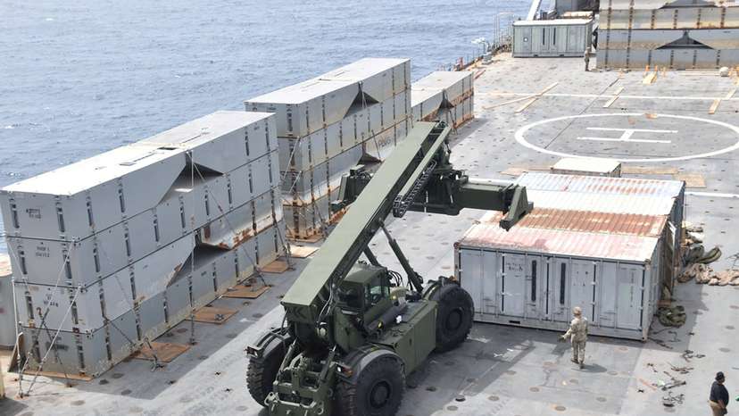 FILE PHOTO: U.S. Navy personnel construct a JLOTS to assist aid to Gaza in the Mediterranean Sea