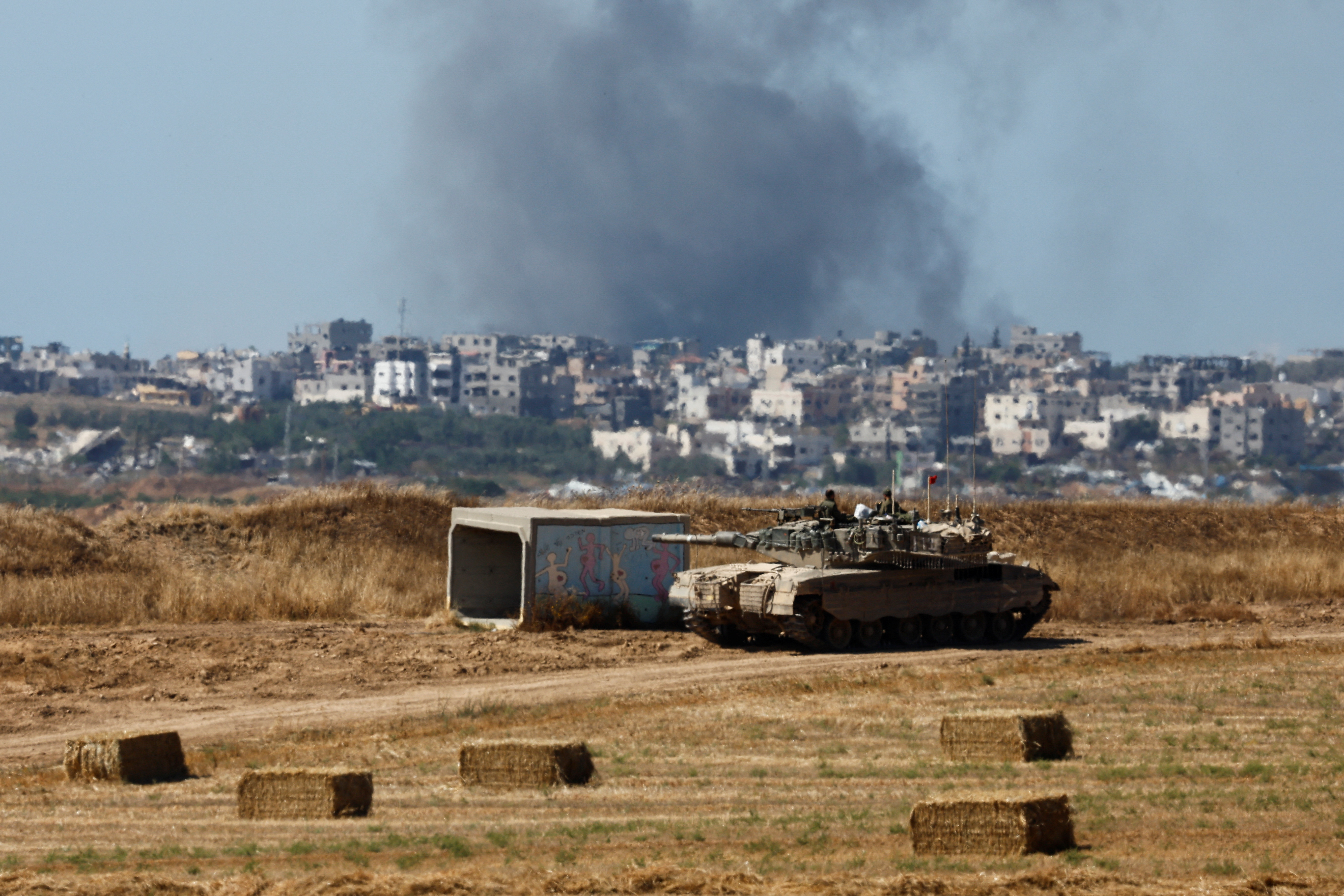 A tank manoeuvres near the Israel-Gaza border