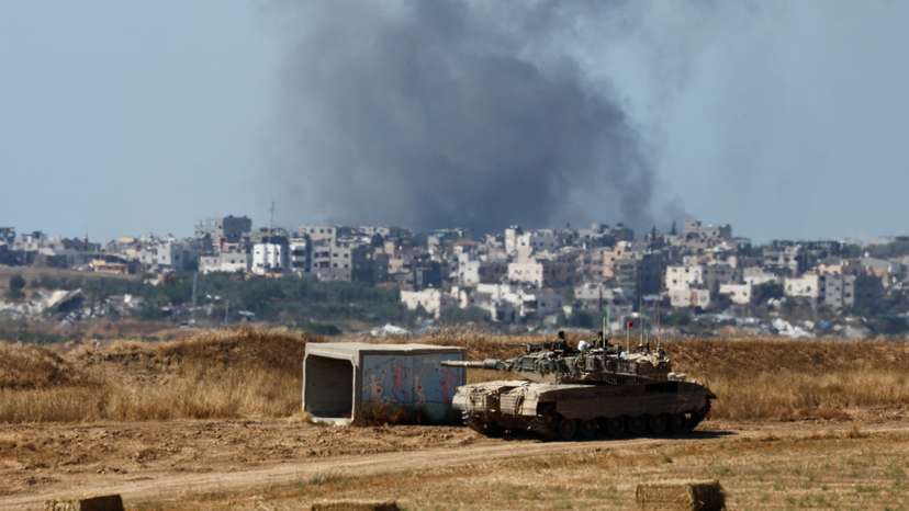 A tank manoeuvres near the Israel-Gaza border