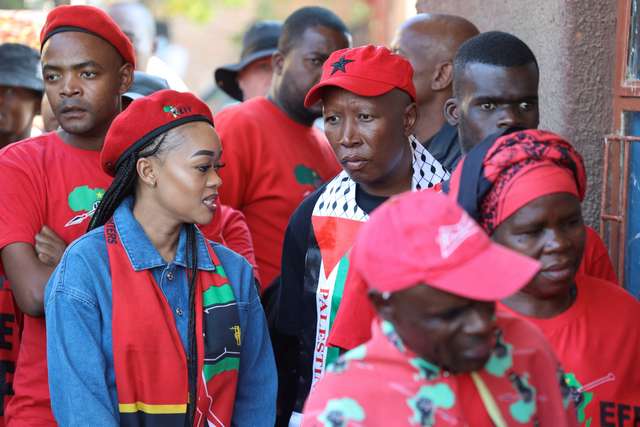Julius Malema, leader of the South African opposition party Economic Freedom Fighters (EFF), wearing a Palestinian scarf, waits to vote during the South African elections in Seshego, Limpopo Province, South Africa May 29, 2024. REUTERS/Alet Pretorius