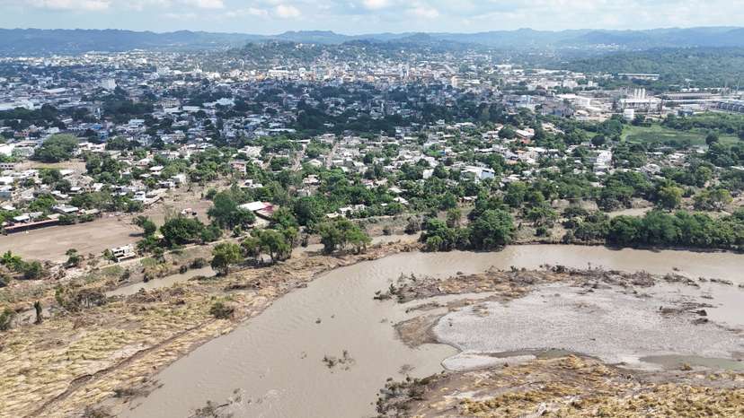 Drone view shows muddy floodwater after a river overflowed following torrential rains, in Mexico