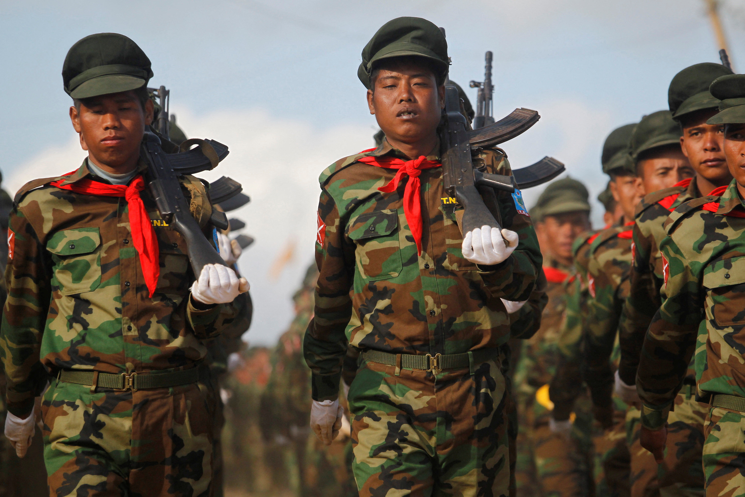 FILE PHOTO: TNLA soliders march during the 51st anniversary of Taang National Resistance Day at Homain