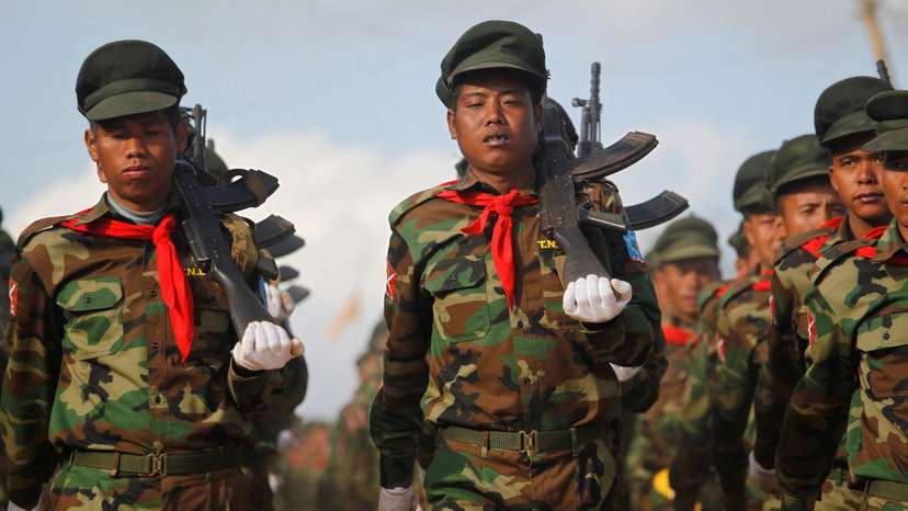 FILE PHOTO: TNLA soliders march during the 51st anniversary of Taang National Resistance Day at Homain