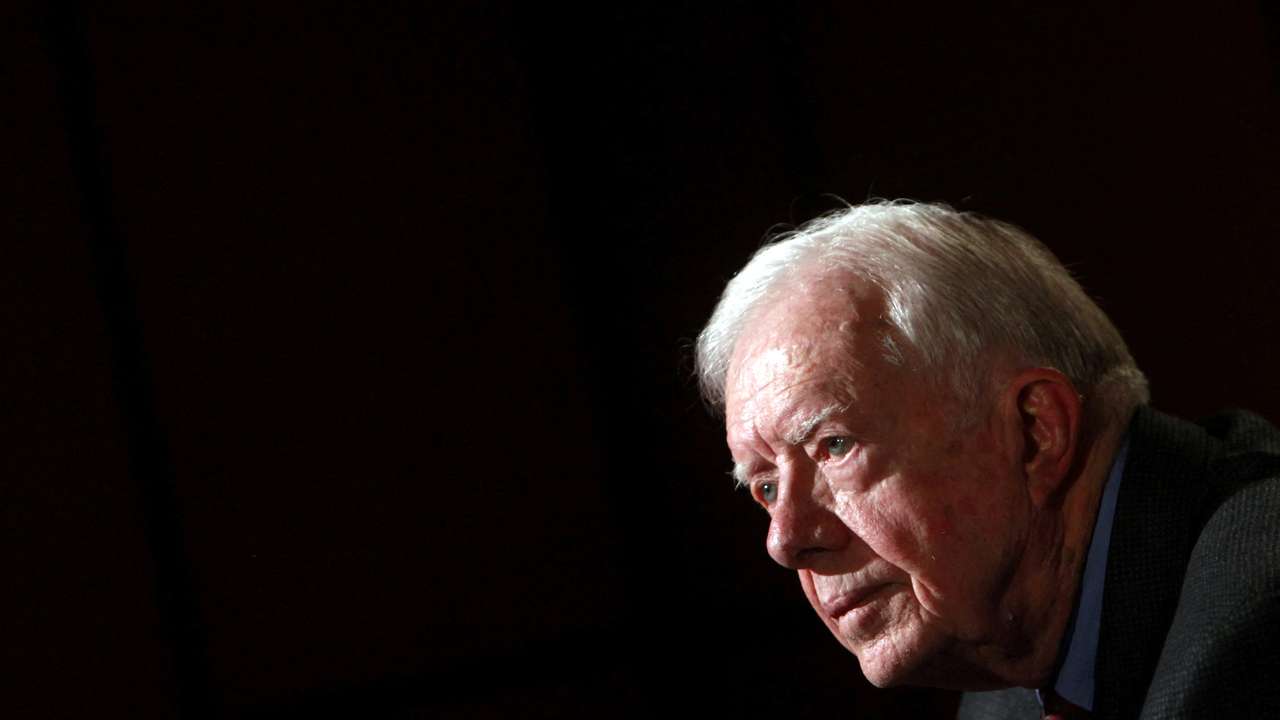 FILE PHOTO: Former U.S. President Jimmy Carter attends an interview with Reuters in Cairo
