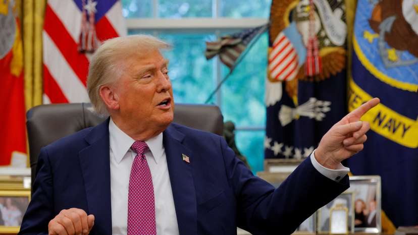 U.S. President Donald Trump signs an executive order at the White House in Washington, D.C.