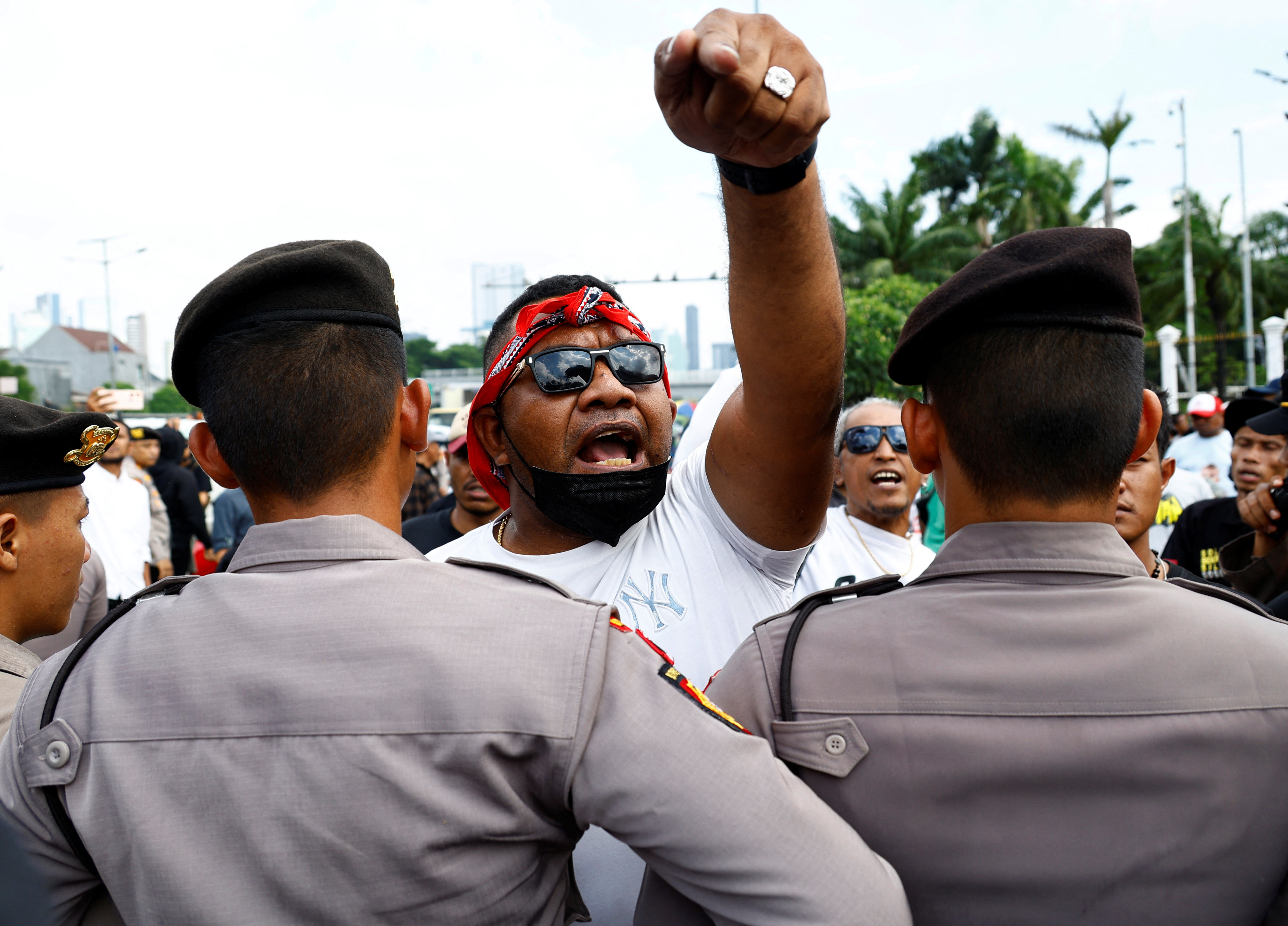 People protest outside Indonesian parliament in Jakarta