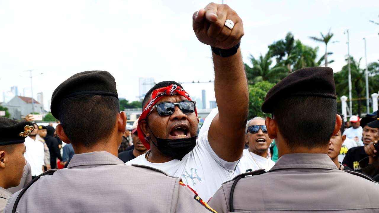 People protest outside Indonesian parliament in Jakarta