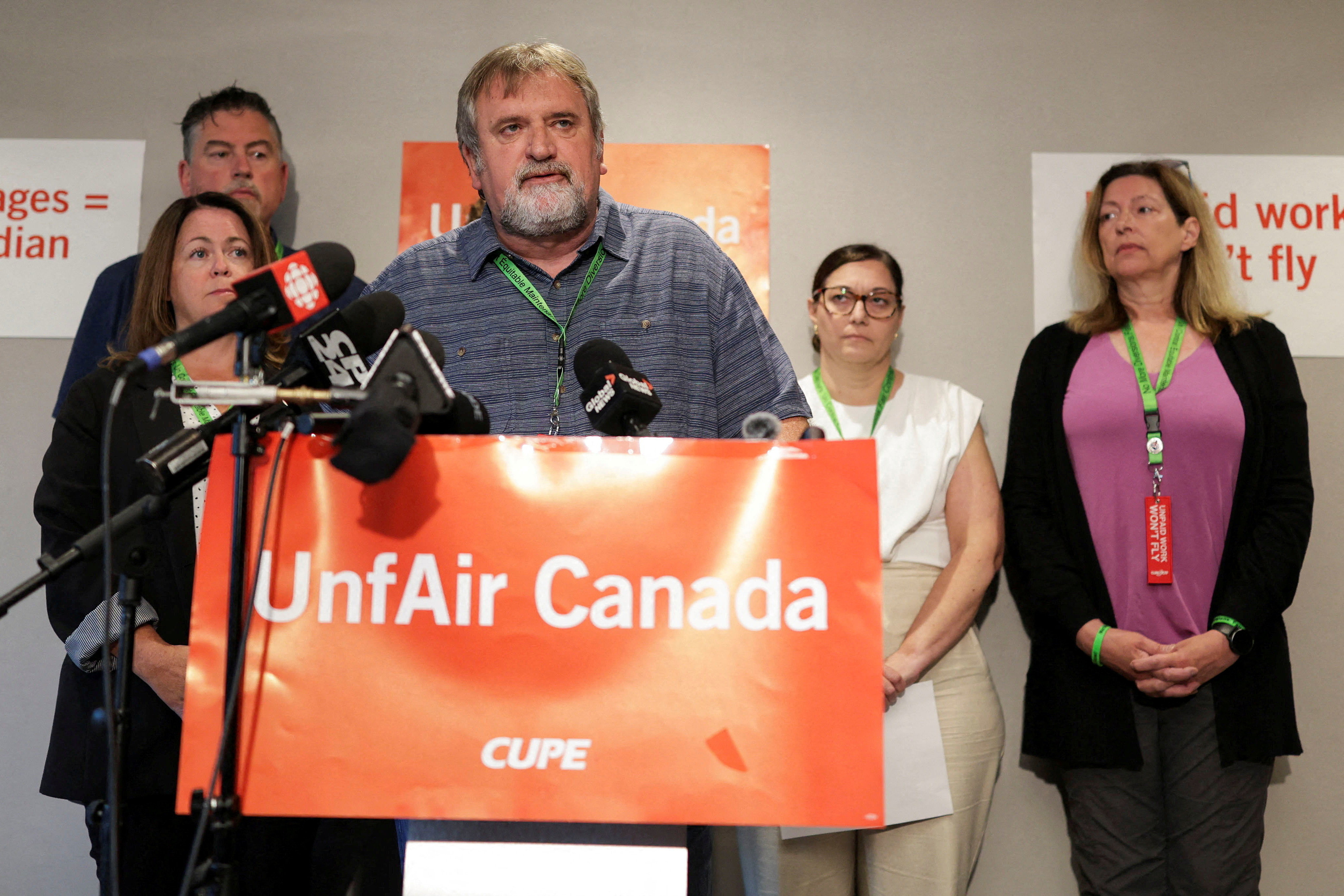 CUPE president Mark Hancock attends a press conference during Air Canada flight attendant strike