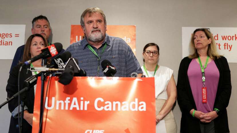 CUPE president Mark Hancock attends a press conference during Air Canada flight attendant strike