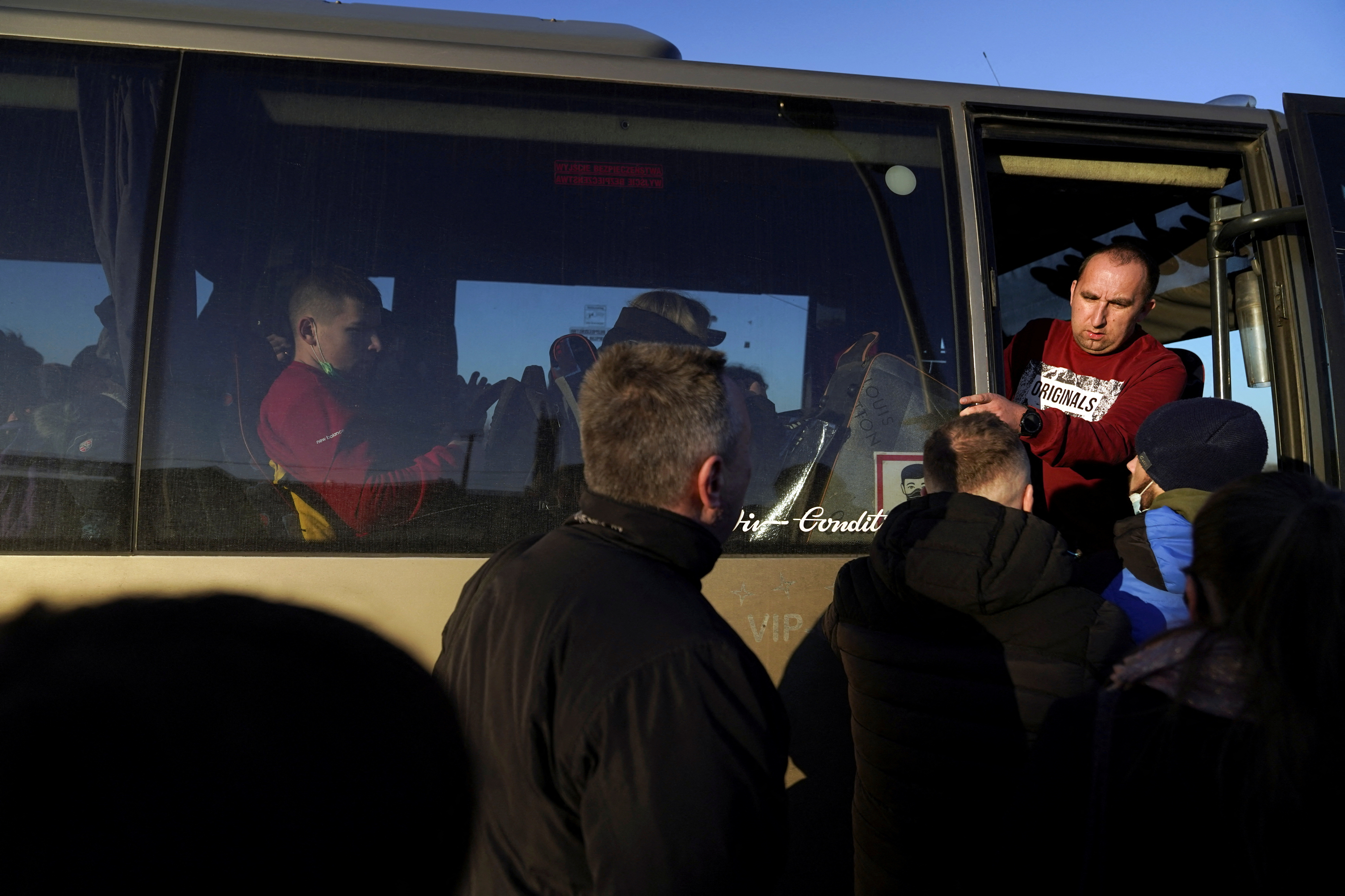 FILE PHOTO: People arrive in Poland after fleeing Ukraine