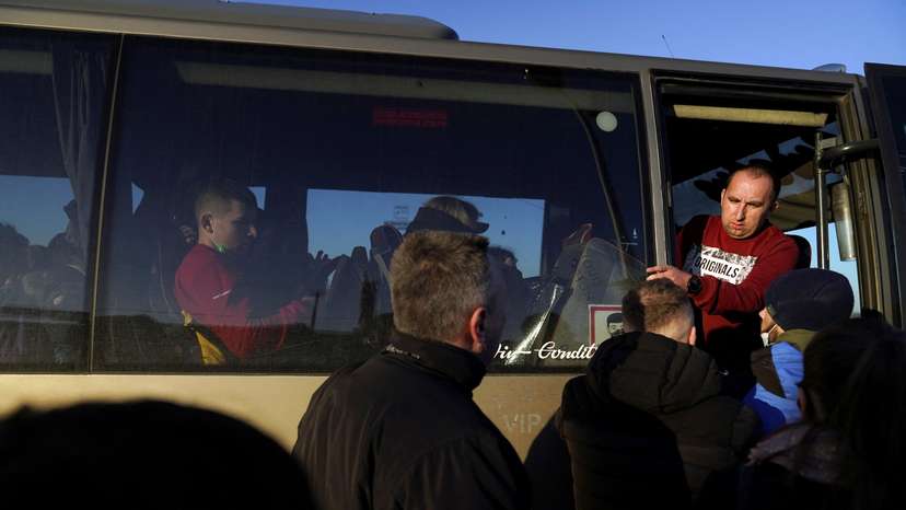 FILE PHOTO: People arrive in Poland after fleeing Ukraine