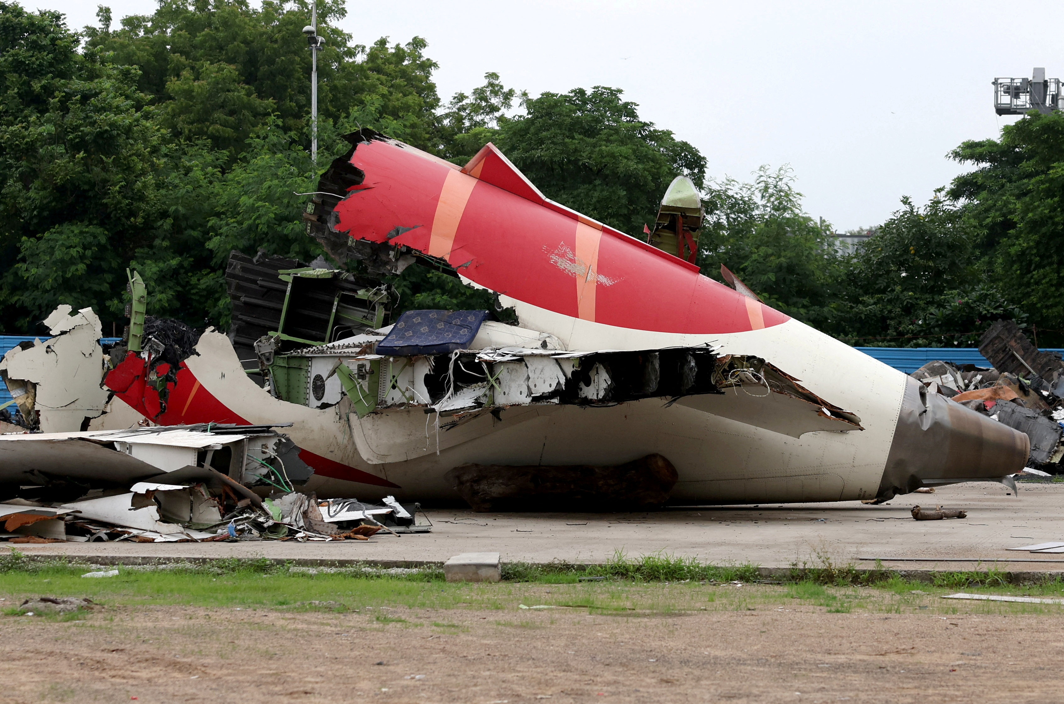 FILE PHOTO: Wreckage of Air India Boeing 787-8 Dreamliner plane, outside Sardar Vallabhbhai Patel International, where it crashed nearby after takeoff, in Ahmedabad