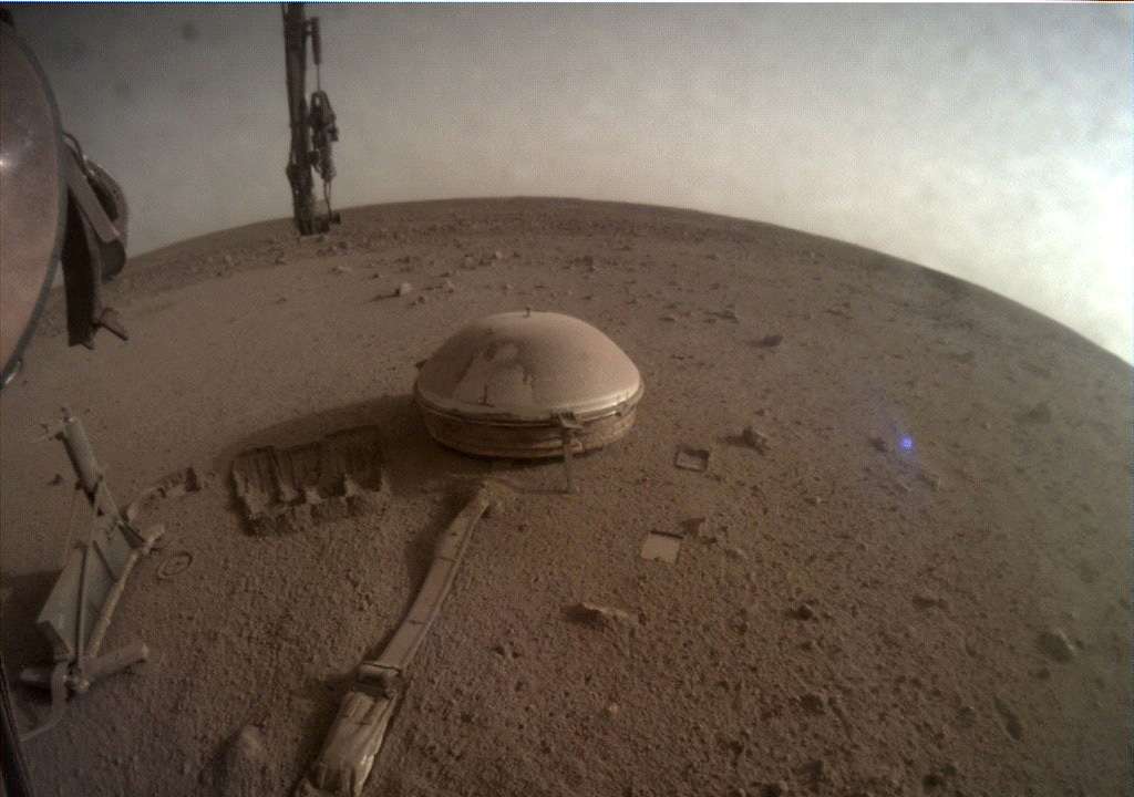 FILE PHOTO: View of the InSight's seismometer on the Martian surface, in one of the last images taken by NASA's InSight Mars lander
