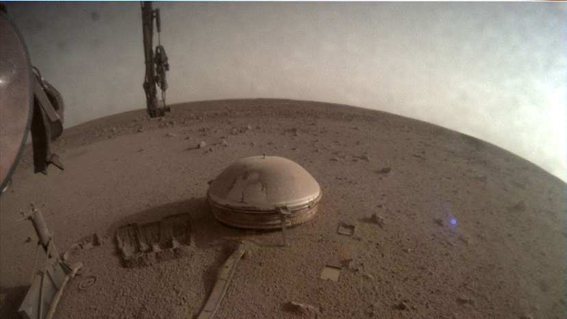 FILE PHOTO: View of the InSight's seismometer on the Martian surface, in one of the last images taken by NASA's InSight Mars lander