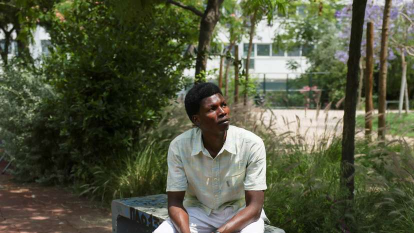 Bahr el-Din Yakoub, a Sudanese migrant looks at open park in Athens