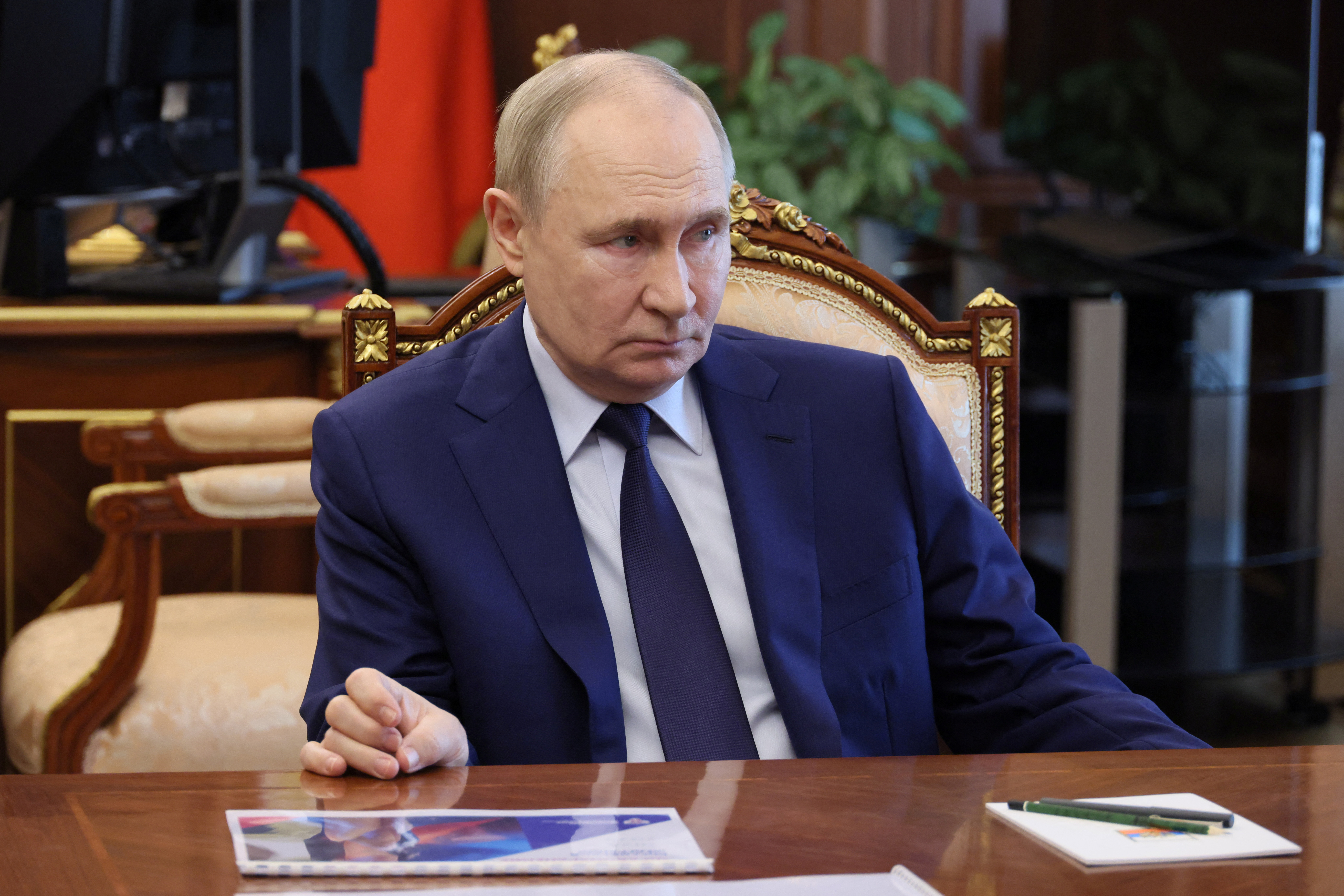 Russian President Vladimir Putin chairs a meeting on social issues, in Moscow