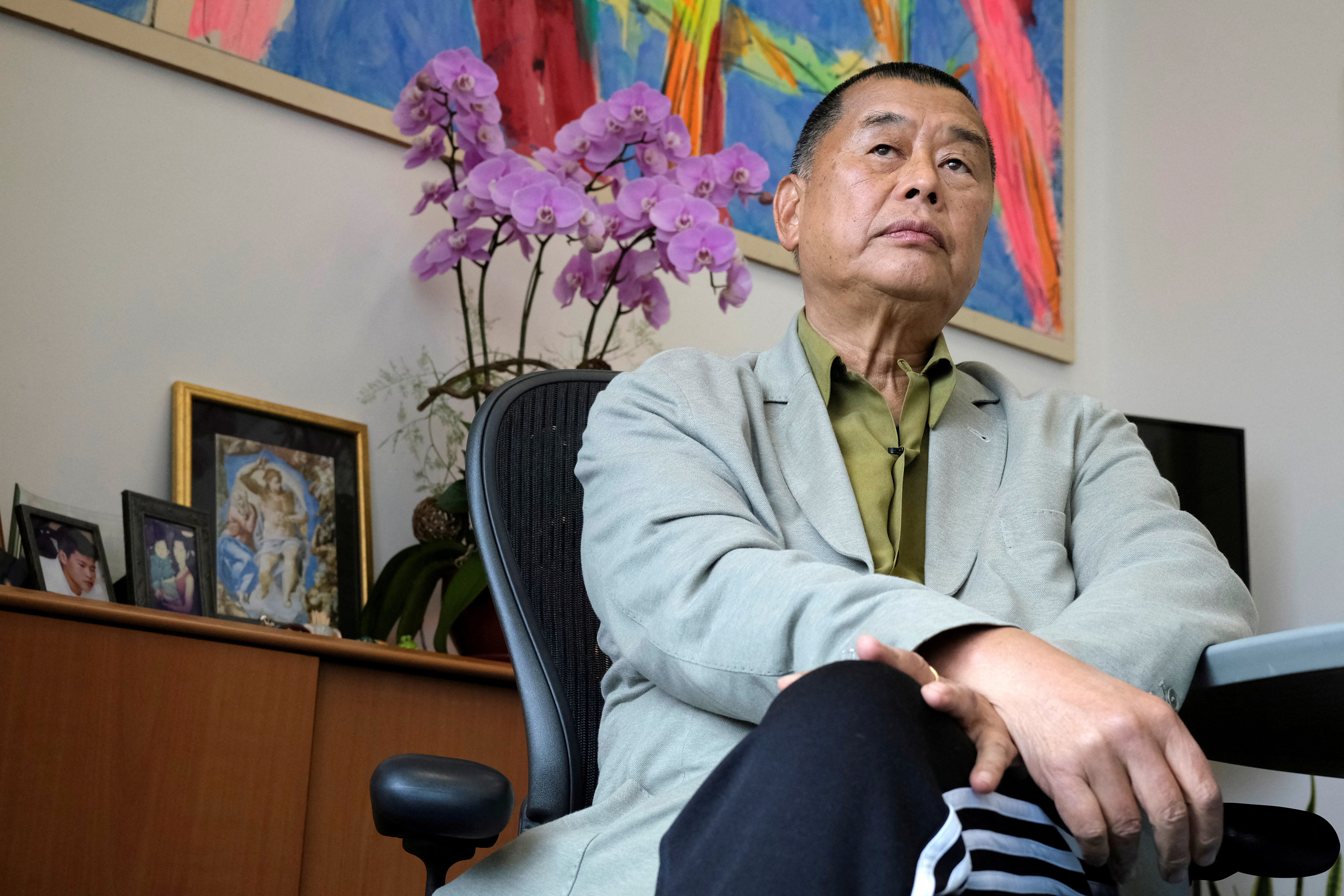 FILE PHOTO: Media mogul Jimmy Lai Chee-ying, founder of Apple Daily speaks during an interview to response national security legislation in Hong Kong