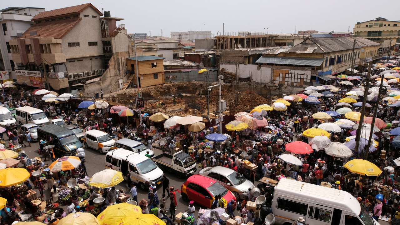 FILE PHOTO: People make trade in Accra