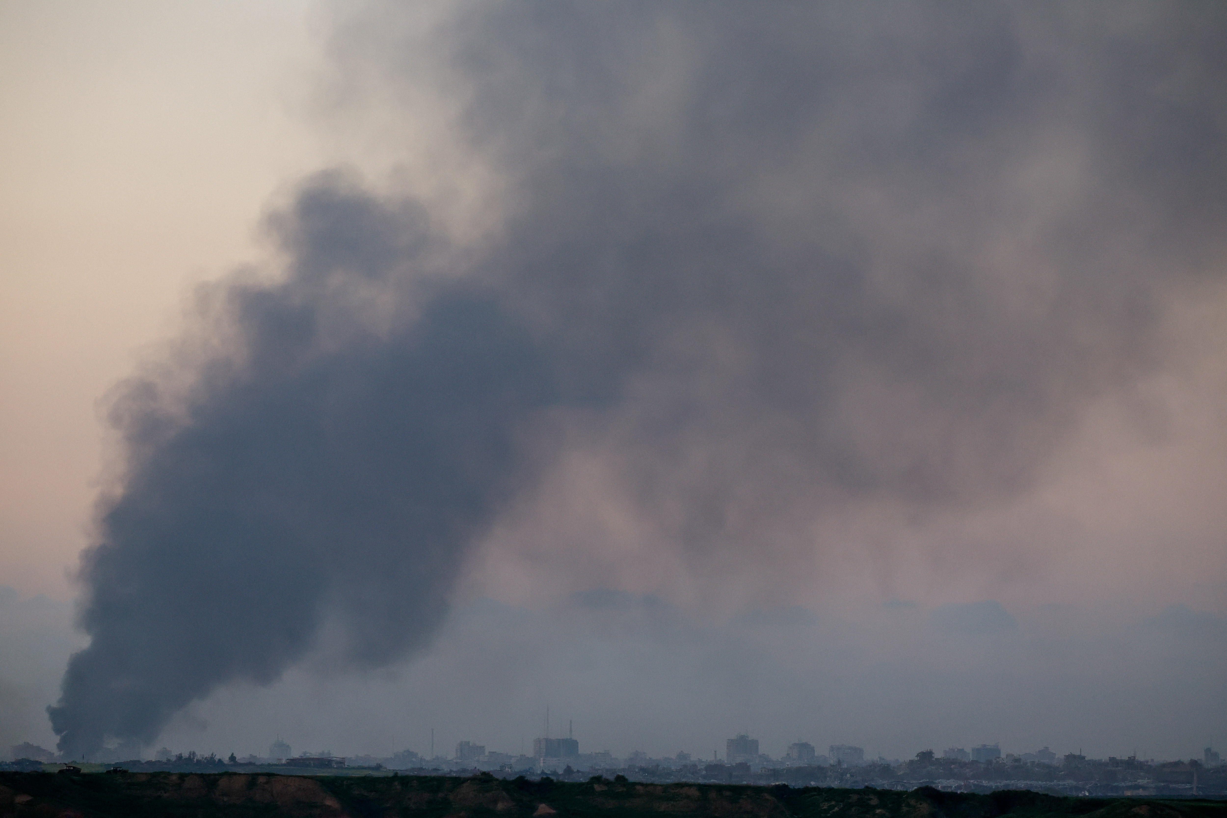 Smoke rises over Gaza, amid the ongoing conflict between Israel and the Palestinian Islamist group Hamas