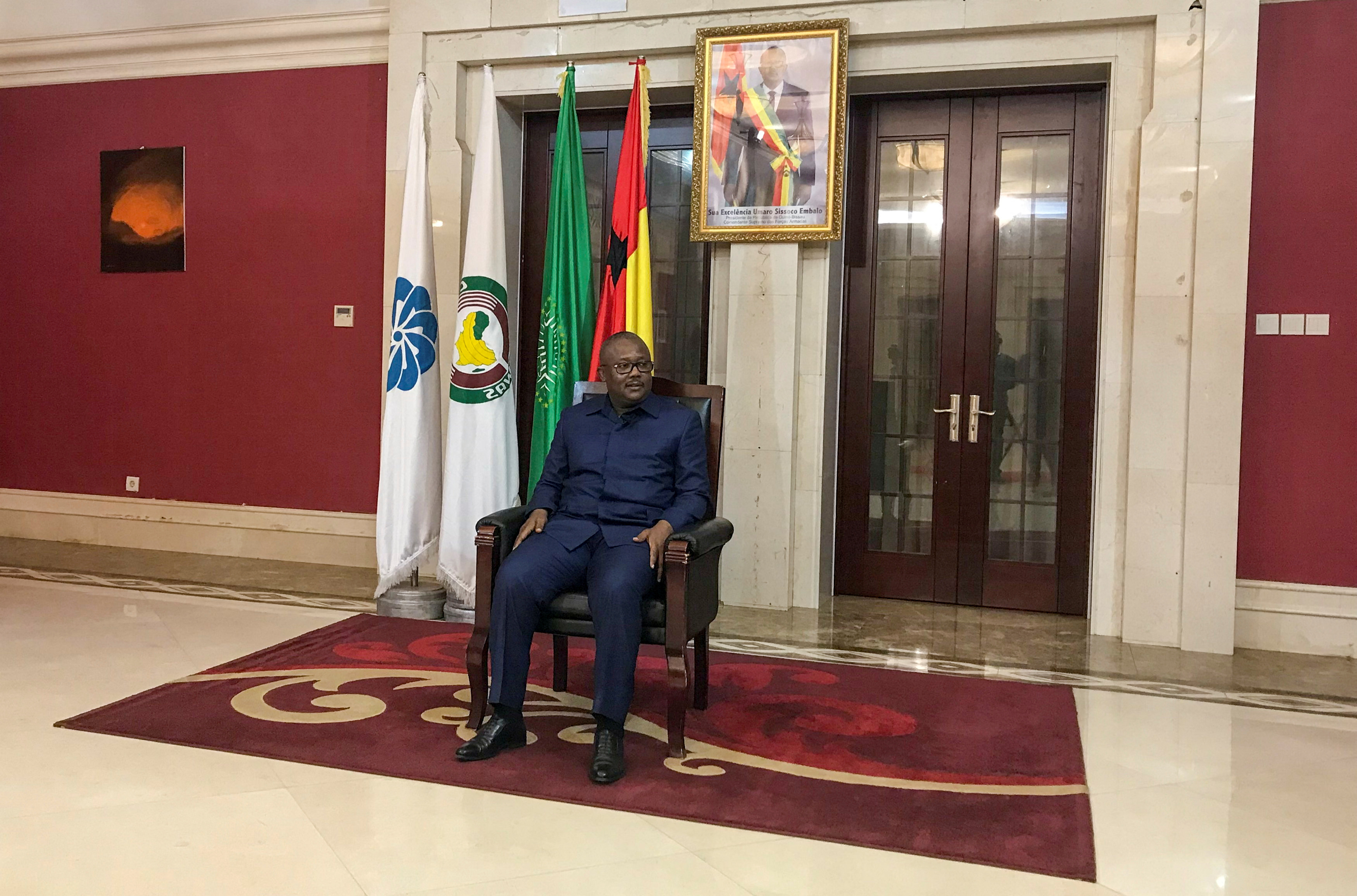 FILE PHOTO: Guinea-Bissau President Umaro Sissoco Embalo speaks to journalists at the presidential palace in Bissau