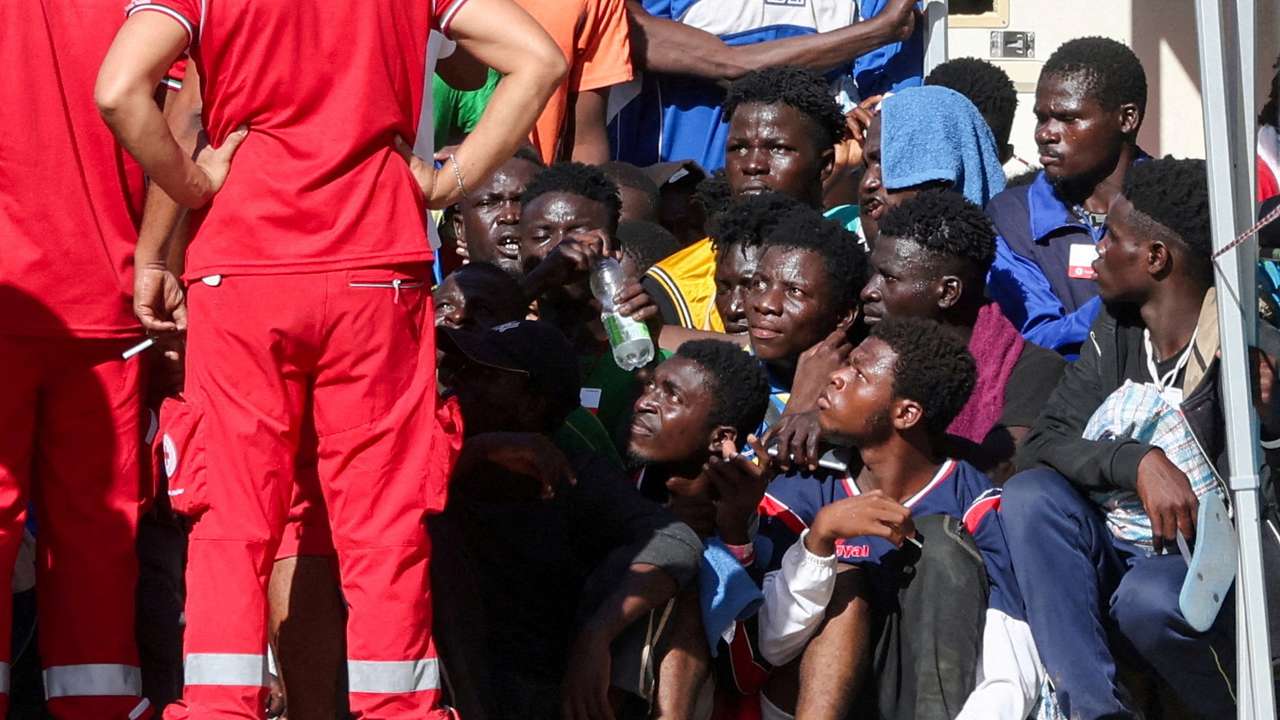 FILE PHOTO: Migrants in Lampedusa
