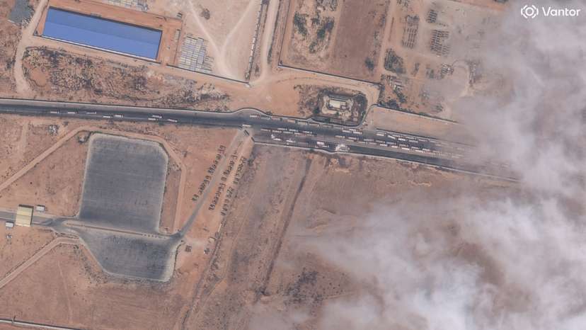 A satellite image shows trucks with aid waiting by the Egypt-Gaza border