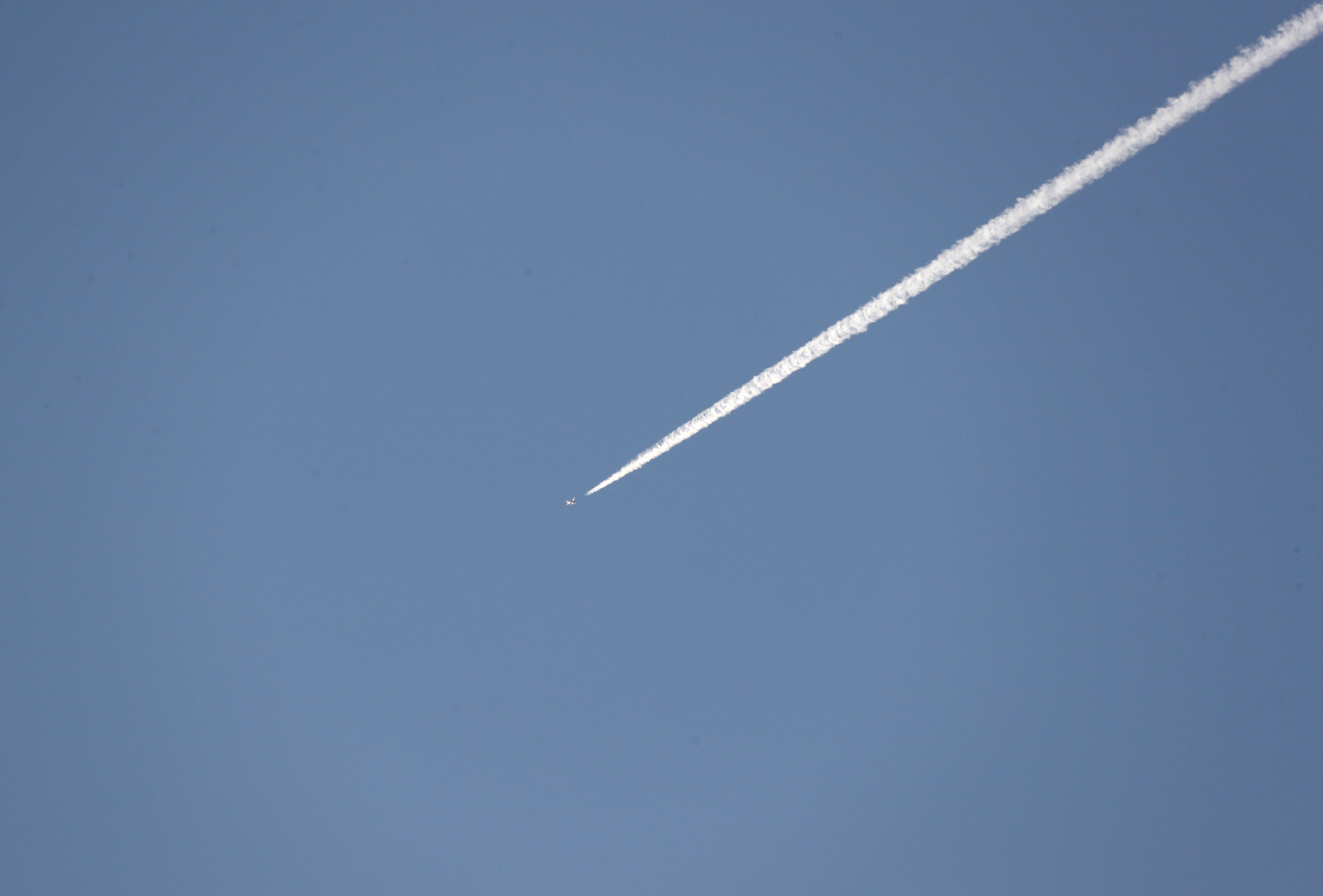 A Turkish fighter jet flies over the town of Hassa on the Turkish-Syrian border in Hatay province
