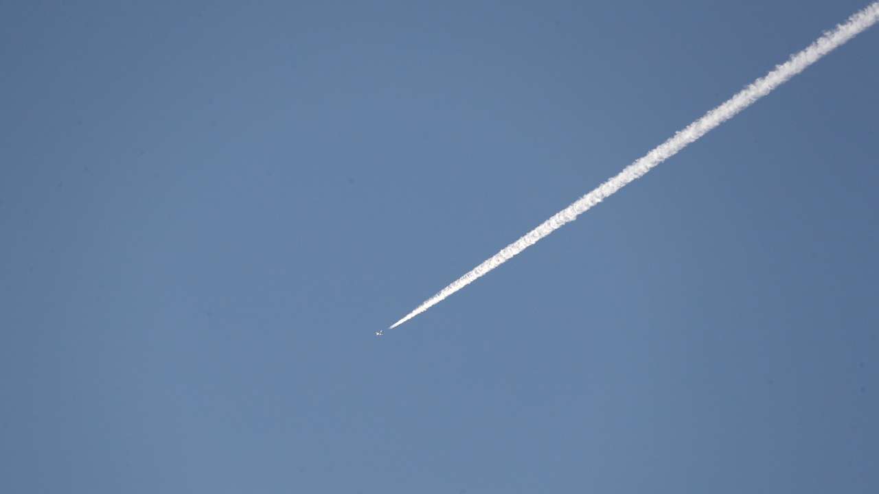 A Turkish fighter jet flies over the town of Hassa on the Turkish-Syrian border in Hatay province
