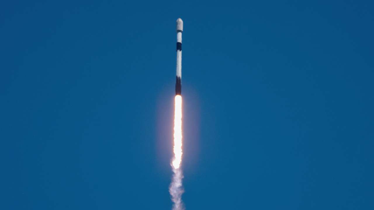FILE PHOTO: A SpaceX Falcon 9 rocket is launched, carrying 23 Starlink satellites into low Earth orbit from Cape Canaveral