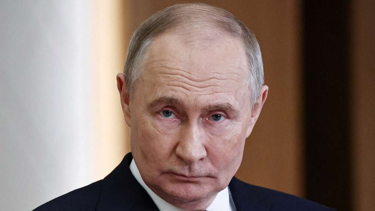 Russian President Putin attends a press conference in Astana