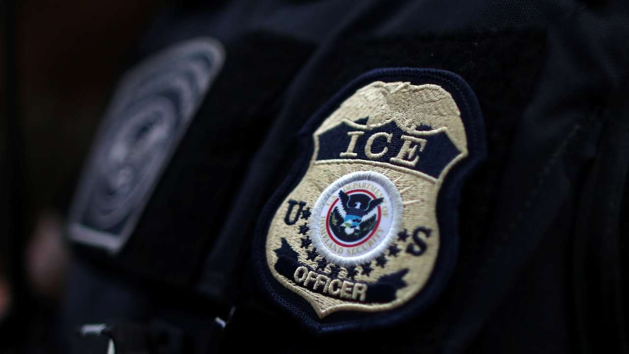The badge of a U.S. Immigration and Customs Enforcement (ICE) officer