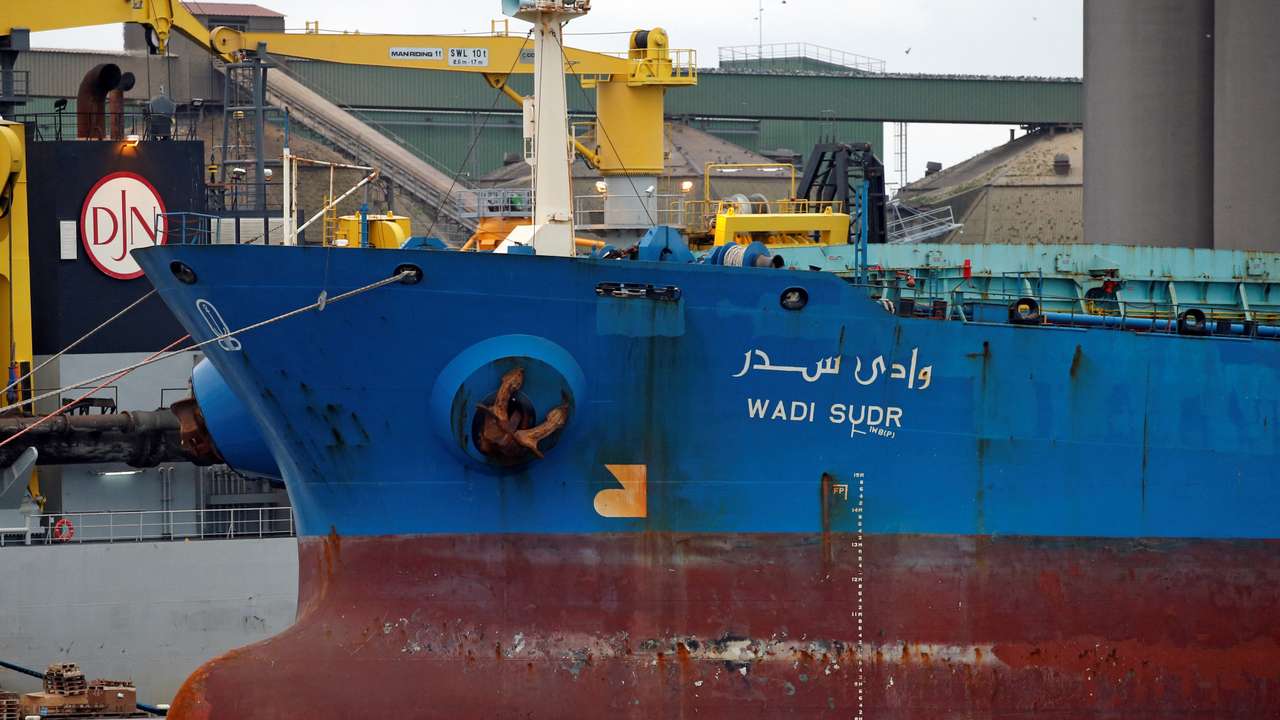 FILE PHOTO: A cargo ship is moored in the harbor of Dunkirk