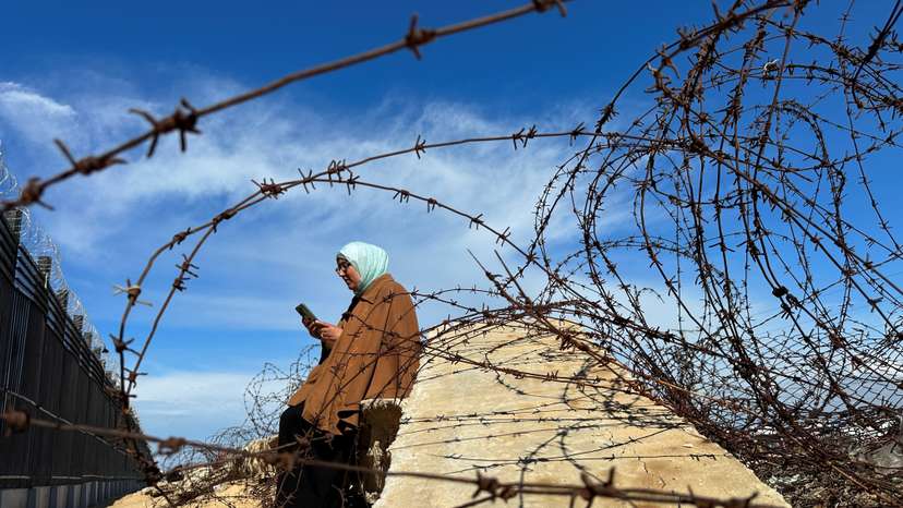 Displaced Palestinians try to get internet signal to communicate with their relatives